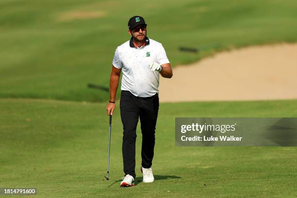 Dean Bermester of South Africa reacts after playing his second shot on the 17th hole during Day Four of the Joburg Open at Houghton GC on November...