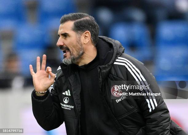 Christian Fiel, Head Coach of 1. FC Nuernberg, gestures during the Second Bundesliga match between Karlsruher SC and 1. FC Nürnberg at BBBank...