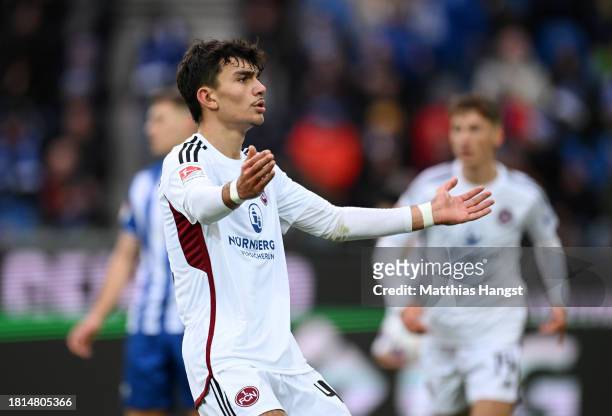 Can Uzun of 1. FC Nuernberg celebrates after scoring the team's first goal during the Second Bundesliga match between Karlsruher SC and 1. FC...