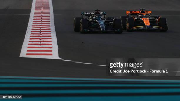 George Russell of Great Britain driving the Mercedes AMG Petronas F1 Team W14 leads Oscar Piastri of Australia driving the McLaren MCL60 Mercedes...
