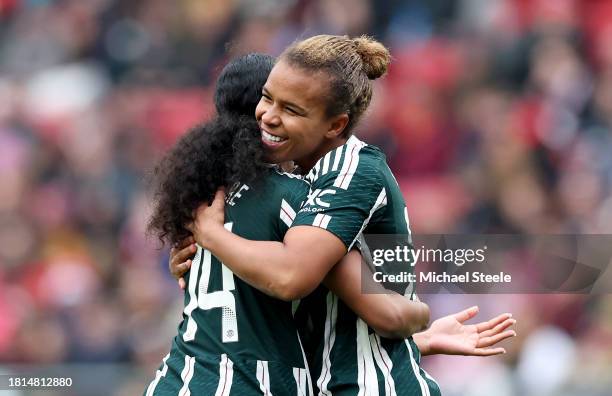 Nikita Parris of Manchester United celebrates with teammate Jayde Riviere after scoring the team's second goal during the Barclays Women´s Super...