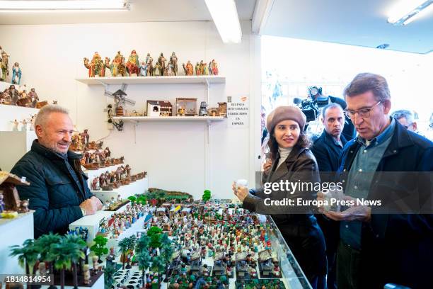 The president of the Popular Party, Alberto Nuñez Feijoo, and the president of the Community of Madrid, Isabel Diaz Ayuso, visit one of the stalls of...