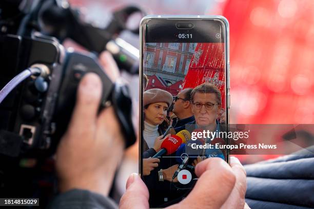 The president of the Popular Party, Alberto Nuñez Feijoo, and the president of the Community of Madrid, Isabel Diaz Ayuso, attend to the media during...