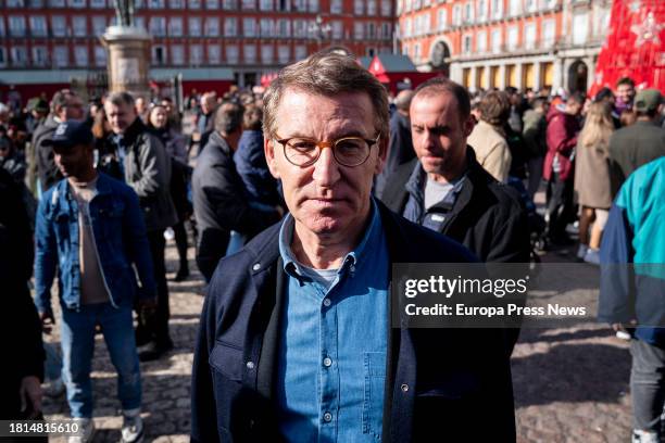 The president of the Partido Popular, Alberto Nuñez Feijoo, visits the Christmas market at the Plaza Mayor in Madrid, on 26 November, 2023 in Madrid,...