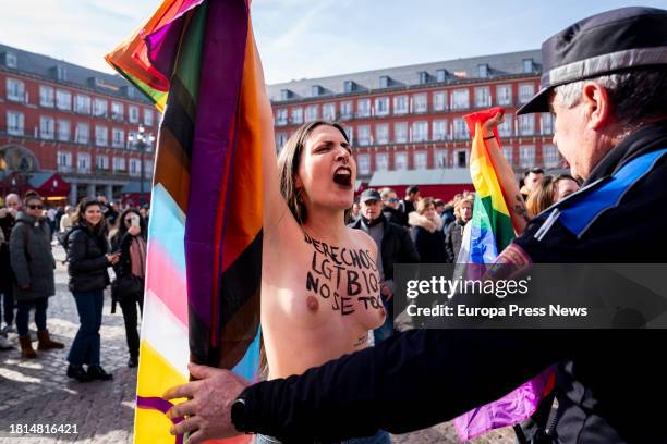 Femen activist protests during the visit of the president of the Popular Party, Alberto Nuñez Feijoo, and the president of the Community of Madrid,...