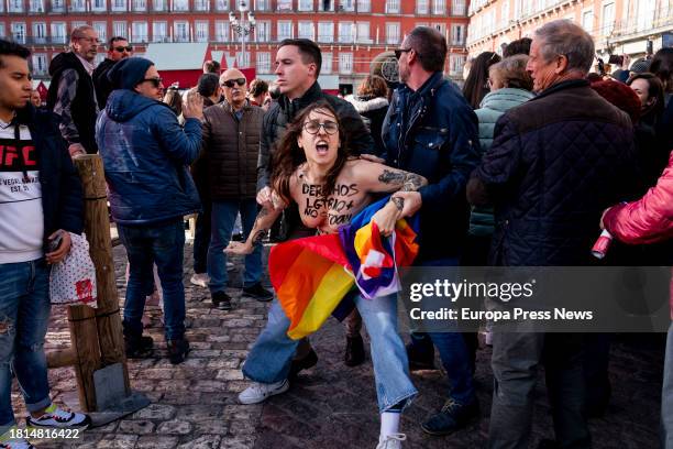 Femen activist protests during the visit of the president of the Popular Party, Alberto Nuñez Feijoo, and the president of the Community of Madrid,...