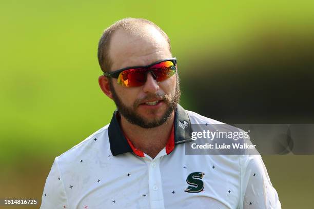 Dean Bermester of South Africa celebrates victory on the 18th green after winning during Day Four of the Joburg Open at Houghton GC on November 26,...