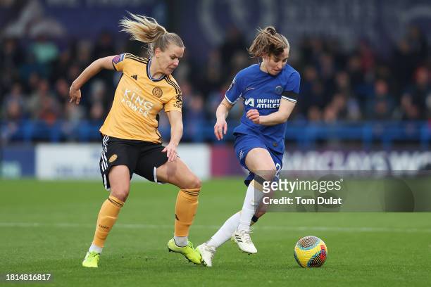 Lena Petermann of Leicester City challenges for the ball with Niamh Charles of Chelsea during the Barclays Women´s Super League match between Chelsea...