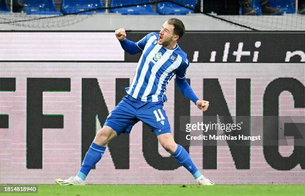 Budu Zivzivadze of Karlsruher SC celebrates after scoring the team's third goal during the Second Bundesliga match between Karlsruher SC and 1. FC...