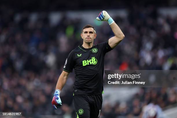 Emiliano Martinez of Aston Villa celebrates as Pau Torres of Aston Villa scores the team's first goal to equalise during the Premier League match...