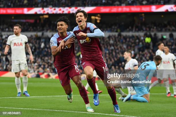 Pau Torres of Aston Villa celebrates with Ollie Watkins of Aston Villa after scoring the team's first goal during the Premier League match between...