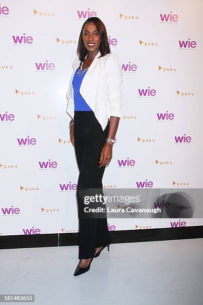 Lisa Leslie attends day 2 of the 4th Annual WIE Symposium at Center 548 on September 21, 2013 in New York City.