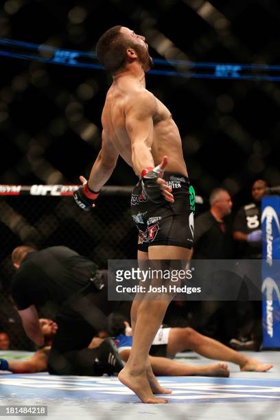 John Makdessi celebrates after defeating Renee Forte in their UFC lightweight bout at the Air Canada Center on September 21, 2013 in Toronto,...