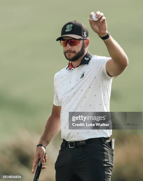 Dean Bermester of South Africa celebrates victory on the 18th green after winning during Day Four of the Joburg Open at Houghton GC on November 26,...
