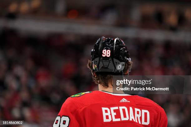 Connor Bedard of the Chicago Blackhawks looks on against the Toronto Maple Leafs during the first period at the United Center on November 24, 2023 in...