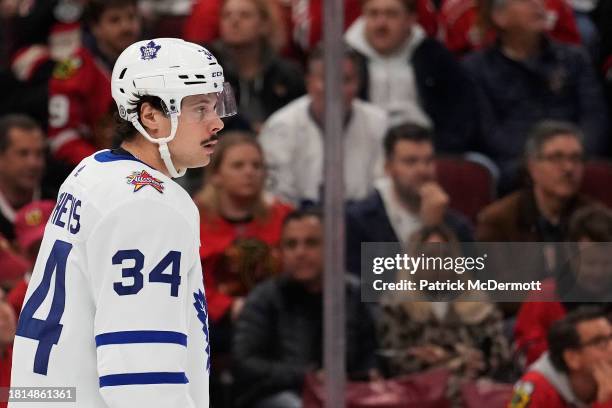 Auston Matthews of the Toronto Maple Leafs looks on against the Chicago Blackhawks during the first period at the United Center on November 24, 2023...