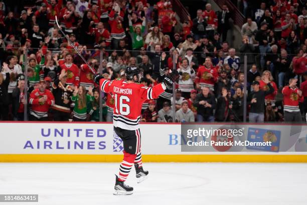 Jason Dickinson of the Chicago Blackhawks celebrates after scoring a goal against the Toronto Maple Leafs during the first period at the United...