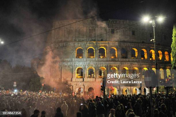 Women take part in demonstration in front of the Colosseum organised by the Italian movement 'Non una di meno' on November 25, 2023 in Rome, Italy....