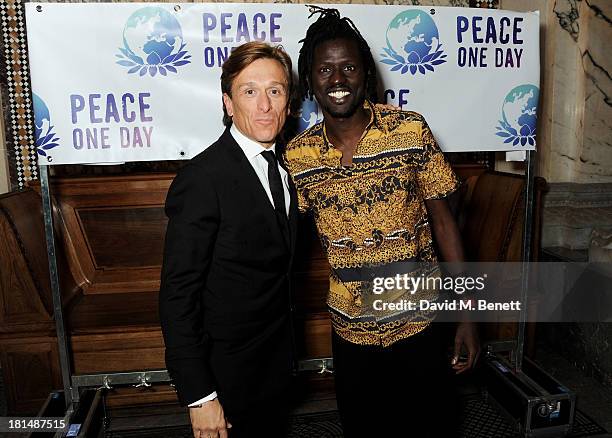 Peace One Day founder Jeremy Gilley and Emmanuel Jal attend the annual Peace One Day concert at the Peace Palace on September 21, 2013 in The Hague,...