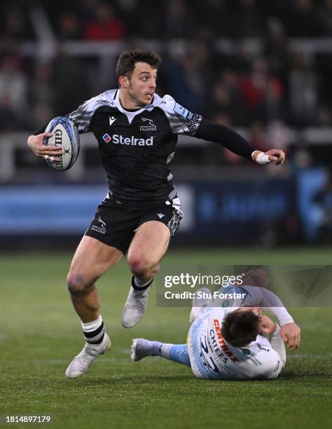 Falcons wing Adam Radwan breaks the tackle of Exeter player Will Haydon-Wood during the Gallagher Premiership Rugby match between Newcastle Falcons...