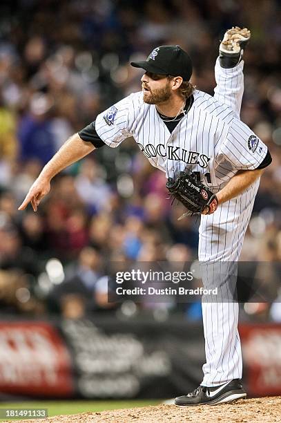 Mitchell Boggs of the Colorado Rockies pitches against the Arizona Diamondbacks during a game at Coors Field on September 20, 2013 in Denver,...