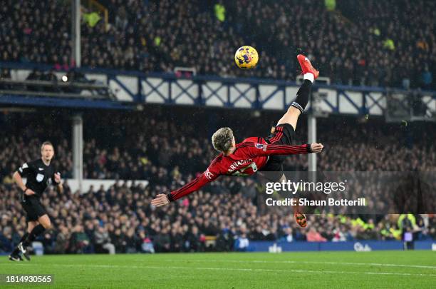 Alejandro Garnacho of Manchester United scores the team's first goal the Premier League match between Everton FC and Manchester United at Goodison...