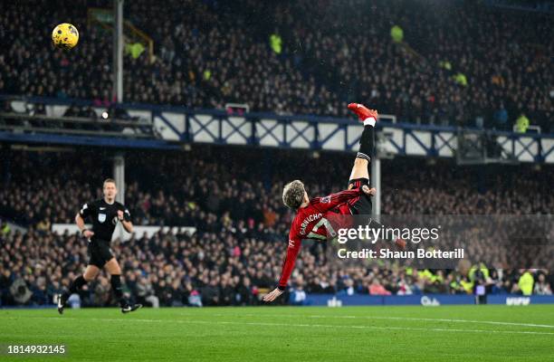 Alejandro Garnacho of Manchester United scores the team's first goal the Premier League match between Everton FC and Manchester United at Goodison...