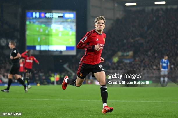 Alejandro Garnacho of Manchester United celebrates after scoring the team's first goal during the Premier League match between Everton FC and...