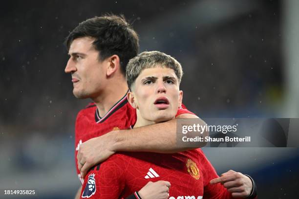 Alejandro Garnacho of Manchester United celebrates with Harry Maguire of Manchester United after scoring the team's first goal during the Premier...