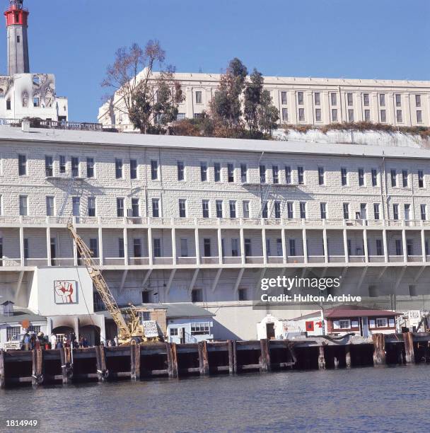 View of Alcatraz Federal Prison decorated with slogans and signs during the takeover of Alcatraz Island by a group of Native Americans, San...