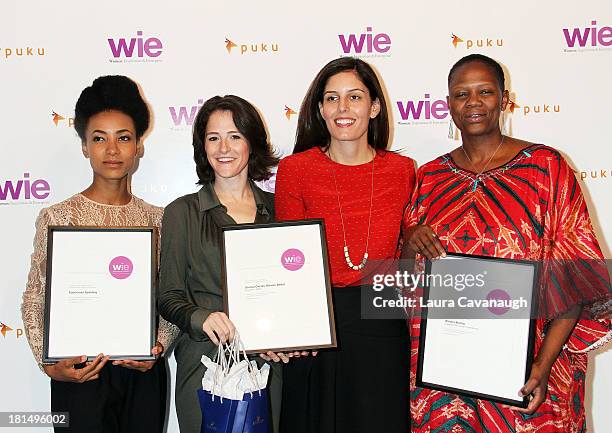 Esperanza Spalding, Maxine Bedat, Soraya Darabi and Wanjira Mathai attend day 2 of the 4th Annual WIE Symposium at Center 548 on September 21, 2013...