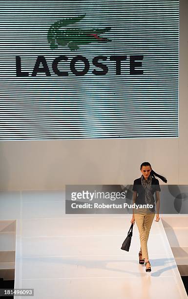 Model walks the runway at Lacoste show during Ciputra World Fashion Week on September 21, 2013 in Surabaya, Indonesia.