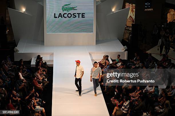 Model walk the runway at Lacoste show during Ciputra World Fashion Week on September 21, 2013 in Surabaya, Indonesia.