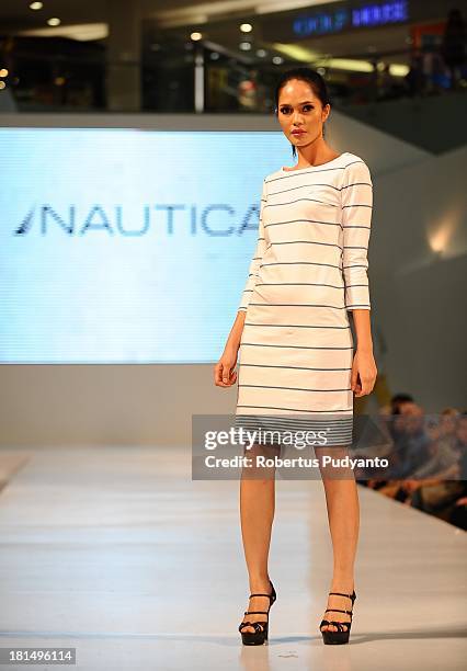 Model walks the runway at Nautica fashion show during Ciputra World Fashion Week on September 21, 2013 in Surabaya, Indonesia.