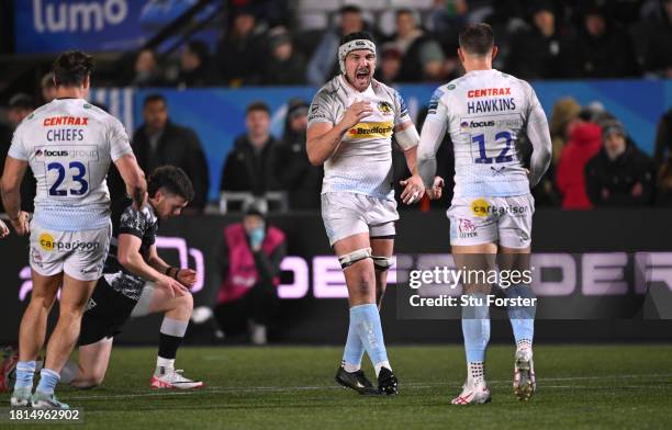 Exeter Rugby players Aidon Davis and Joe Hawkins celebrate victory during the Gallagher Premiership Rugby match between Newcastle Falcons and Exeter...