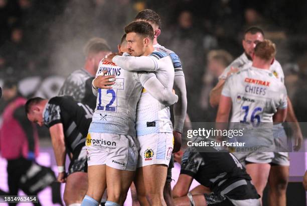 Exeter Rugby players Henry Slade and Joe Hawkins celebrate victory during the Gallagher Premiership Rugby match between Newcastle Falcons and Exeter...