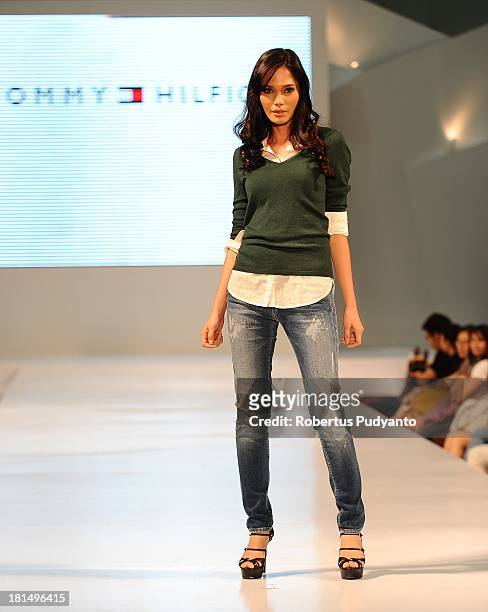 Model walks the runway at Tommy Hilfiger show during Ciputra World Fashion Week on September 21, 2013 in Surabaya, Indonesia.