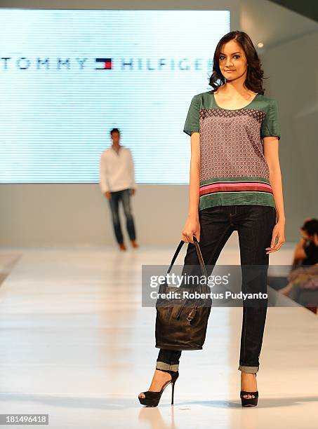 Model walks the runway at Tommy Hilfiger show during Ciputra World Fashion Week on September 21, 2013 in Surabaya, Indonesia.