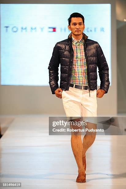 Model walks the runway at Tommy Hilfiger show during Ciputra World Fashion Week on September 21, 2013 in Surabaya, Indonesia.