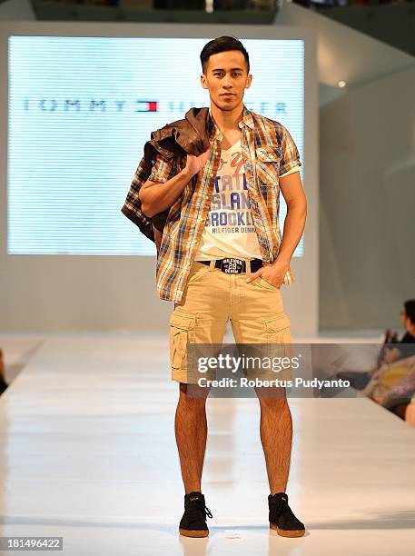 Model walks the runway at Tommy Hilfiger show during Ciputra World Fashion Week on September 21, 2013 in Surabaya, Indonesia.