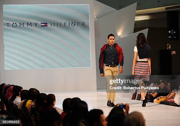 Model walk the runway at Tommy Hilfiger show during Ciputra World Fashion Week on September 21, 2013 in Surabaya, Indonesia.