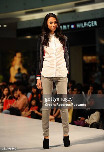 Model walks the runway at Tommy Hilfiger show during Ciputra World Fashion Week on September 21, 2013 in Surabaya, Indonesia.