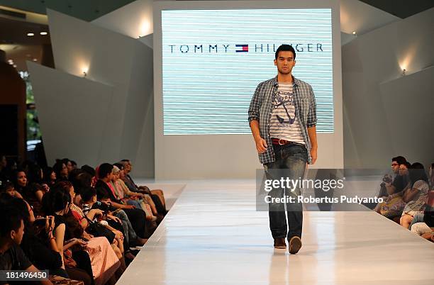 Model walks the runway at Tommy Hilfiger show during Ciputra World Fashion Week on September 21, 2013 in Surabaya, Indonesia.