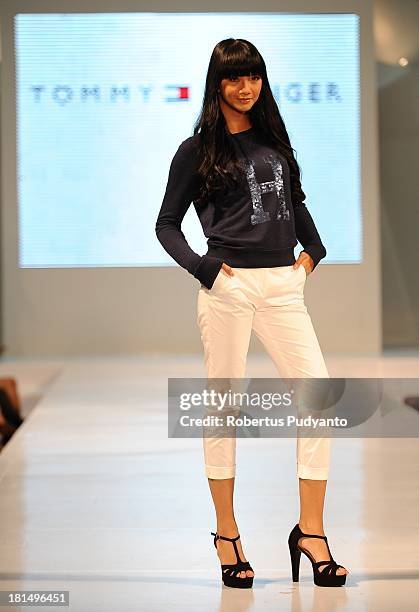 Model walks the runway at Tommy Hilfiger show during Ciputra World Fashion Week on September 21, 2013 in Surabaya, Indonesia.