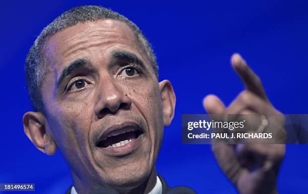 President Barack Obama delivers remarks at the Congressional Black Caucus Foundation, Inc. Annual Phoenix Awards September 21, 2013 at the Washington...