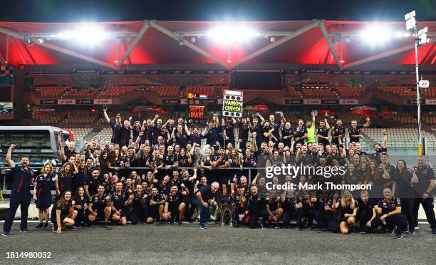 Race winner Max Verstappen of the Netherlands and Oracle Red Bull Racing celebrates with his team in the Pitlane after the F1 Grand Prix of Abu Dhabi...