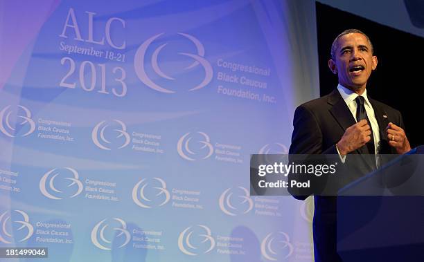 President Barack Obama makes remarks at the Congressional Black Caucus Foundation Annual Phoenix Awards dinner, September 21, 2013 in Washington, DC....