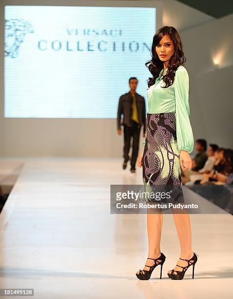 Model walks the runway at Versace Collection show during Ciputra World Fashion Week on September 21, 2013 in Surabaya, Indonesia.