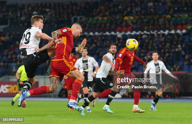 Gianluca Mancini of AS Roma scores the team's first goal during the Serie A TIM match between AS Roma and Udinese Calcio at Stadio Olimpico on...