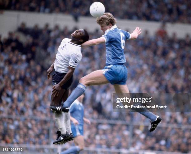 Garth Crooks of Tottenham Hotspur is beaten in the air by Tommy Caton of Manchester City during the FA Cup final at Wembley Stadium on May 9, 1981 in...